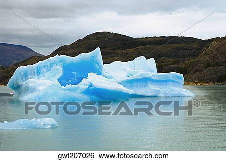 Stock Photograph - Iceberg in a lake, Lake Argentino, Patagonia, Argentina. Fotosearch