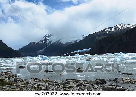 Pieces of icebergs in a lake, Bahia Onelli, Argentine Glaciers National Park, Patagonia, Argentina View Large Photo Image Stock Image - Pieces of icebergs in a lake, Bahia Onelli, Argentine Glaciers National Park, Patagonia, Argentina. Fotosearch