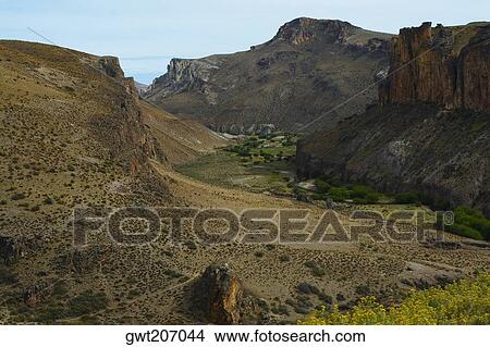 Picture - Rock formations on a landscape, Pinturas River, Patagonia, Argentina. Fotosearch