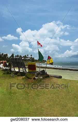 Flags fluttering at the seaside, San Andres, Providencia y Santa Catalina, San Andres y Providencia Department, Colombia View Large Photo Image Stock Photo - Flags fluttering at the seaside, San Andres, Providencia y Santa Catalina, San Andres y Providencia Department, Colombia. Fotosearch