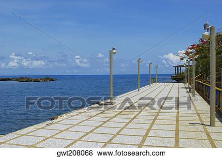 Lamppost on a path at the seaside, San Andres, Providencia y Santa Catalina, San Andres y Providencia Department, Colombia View Large Photo Image Stock Photo - Lamppost on a path at the seaside, San Andres, Providencia y Santa Catalina, San Andres y Providencia Department, Colombia. Fotosearch