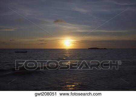 Sunset over the sea, South West Bay, Providencia, Providencia y Santa Catalina, San Andres y Providencia Department, Colombia View Large Photo Image Stock Image - Sunset over the sea, South West Bay, Providencia, Providencia y Santa Catalina, San Andres y Providencia Department, Colombia. Fotosearch
