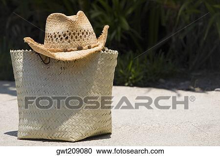 Close-up of a straw hat on a straw bag, Cancun, Mexico View Large Photo Image Stock Image - Close-up of a straw hat on a straw bag, Cancun, Mexico. Fotosearch
