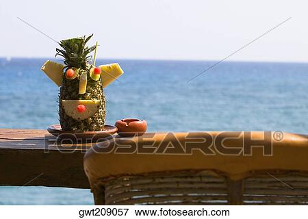 Decorated pineapple on a plate, Cancun, Mexico View Large Photo Image Stock Photo - Decorated pineapple on a plate, Cancun, Mexico. Fotosearch