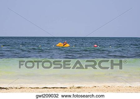 Side profile of a person boating in the sea, Cancun, Mexico View Large Photo Image Stock Image - Side profile of a person boating in the sea, Cancun, Mexico. Fotosearch