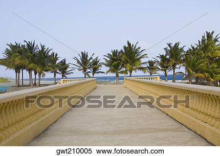 Bridge leading towards the beach, Dixon Cove, Roatan, Bay Islands, Honduras View Large Photo Image Stock Photography - Bridge leading towards the beach, Dixon Cove, Roatan, Bay Islands, Honduras. Fotosearch
