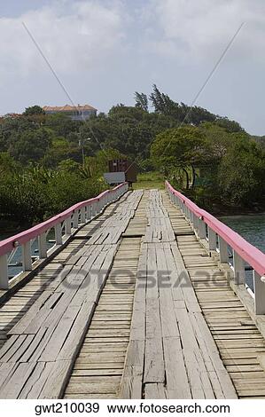 Bridge over the sea, Dixon Cove, Roatan, Bay Islands, Honduras View Large Photo Image Stock Photo - Bridge over the sea, Dixon Cove, Roatan, Bay Islands, Honduras. Fotosearch