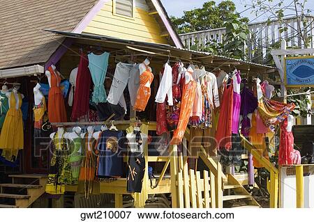 Clothes hanging at a market stall, West End, Roatan, Bay Islands, Honduras View Large Photo Image Stock Photo - Clothes hanging at a market stall, West End, Roatan, Bay Islands, Honduras. Fotosearch