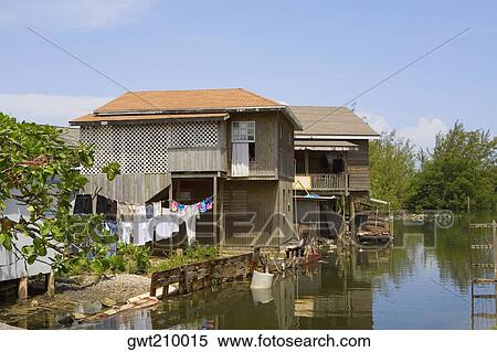 Houses at the riverside, Honduras View Large Photo Image Stock Photography - Houses at the riverside, Honduras. Fotosearch