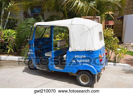 Stock Image - Jinrikisha parked at the roadside, Honduras. Fotosearch
