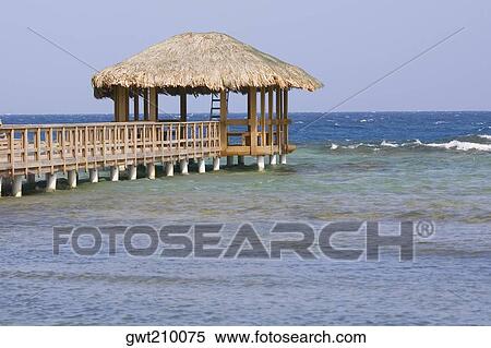 Stock Photography - Pier in the sea, Osgood Cay, Roatan, Bay Islands, Honduras. Fotosearch