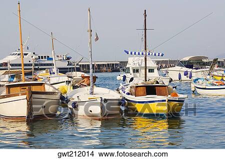 Boats docked at a port, Marina Grande, Capri, Campania, Italy View Large Photo Image Picture - Boats docked at a port, Marina Grande, Capri, Campania, Italy. Fotosearch