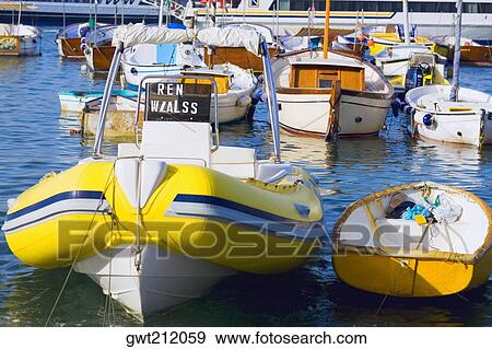 Boats docked at a port, Marina Grande, Capri, Campania, Italy View Large Photo Image Stock Photo - Boats docked at a port, Marina Grande, Capri, Campania, Italy. Fotosearch
