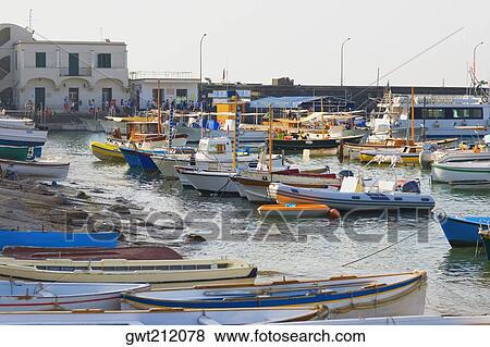Boats docked at a port, Marina Grande, Capri, Campania, Italy View Large Photo Image Stock Photo - Boats docked at a port, Marina Grande, Capri, Campania, Italy. Fotosearch