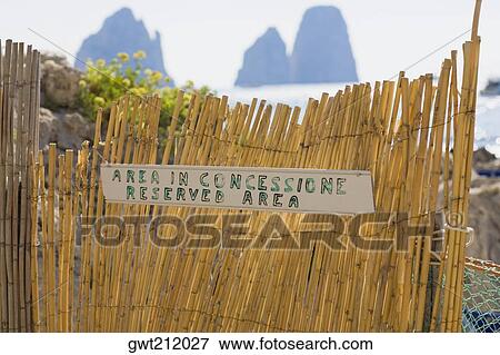 Close-up of an information board on a wooden fence, Capri, Campania, Italy View Large Photo Image Stock Photo - Close-up of an information board on a wooden fence, Capri, Campania, Italy. Fotosearch