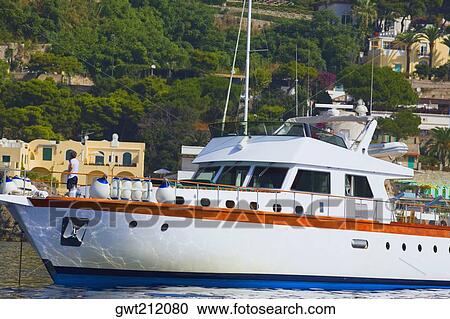 Cruise ship docked at a port, Marina Grande, Capri, Campania, Italy View Large Photo Image Stock Image - Cruise ship docked at a port, Marina Grande, Capri, Campania, Italy. Fotosearch