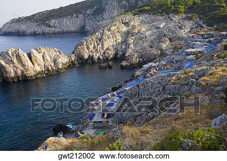 High angle view of a beach, Marine Piccola Beach, Capri, Campania, Italy View Large Photo Image Stock Image - High angle view of a beach, Marine Piccola Beach, Capri, Campania, Italy. Fotosearch