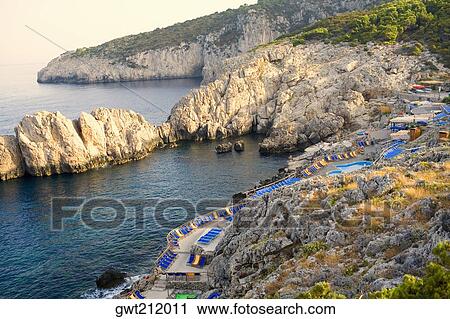 High angle view of a beach, Marine Piccola Beach, Capri, Campania, Italy View Large Photo Image Stock Image - High angle view of a beach, Marine Piccola Beach, Capri, Campania, Italy. Fotosearch