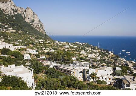 High angle view of buildings at the waterfront, Capri, Campania, Italy View Large Photo Image Stock Photo - High angle view of buildings at the waterfront, Capri, Campania, Italy. Fotosearch