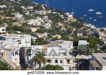 High angle view of buildings in a town, Capri, Campania, Italy View Large Photo Image Stock Photo - High angle view of buildings in a town, Capri, Campania, Italy. Fotosearch