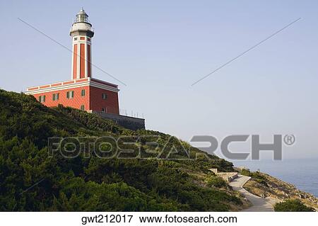 Low angle view of a lighthouse, Capri Lighthouse, Capri, Campania, Italy View Large Photo Image Stock Photo - Low angle view of a lighthouse, Capri Lighthouse, Capri, Campania, Italy. Fotosearch