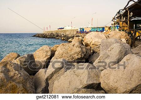 Rocks on the beach, Marine Piccola Beach, Capri, Campania, Italy View Large Photo Image Stock Image - Rocks on the beach, Marine Piccola Beach, Capri, Campania, Italy. Fotosearch