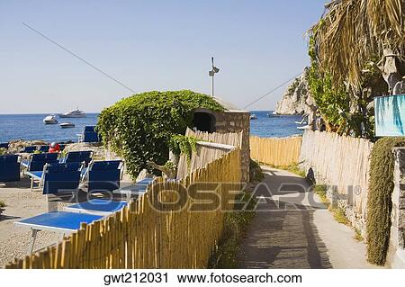 Walkway on the beach, Capri, Campania, Italy View Large Photo Image Stock Image - Walkway on the beach, Capri, Campania, Italy. Fotosearch