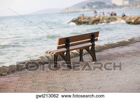 Empty bench at the seaside, Ephesus, Turkey View Large Photo Image Stock Image - Empty bench at the seaside, Ephesus, Turkey. Fotosearch