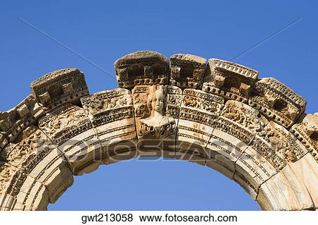 High section view of a ruined gate, Temple of Hadrian, Ephesus, Turkey View Large Photo Image Stock Photo - High section view of a ruined gate, Temple of Hadrian, Ephesus, Turkey. Fotosearch