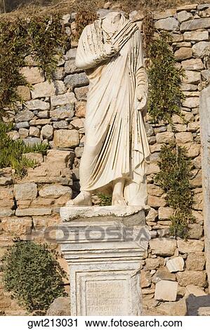 Statue in front of a stone wall, Ephesus, Turkey View Large Photo Image Stock Image - Statue in front of a stone wall, Ephesus, Turkey. Fotosearch