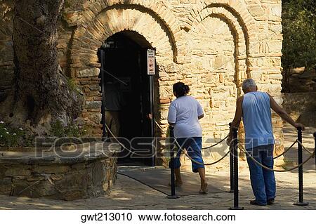 Tourists entering an old building, Ephesus, Turkey View Large Photo Image Stock Image - Tourists entering an old building, Ephesus, Turkey. Fotosearch