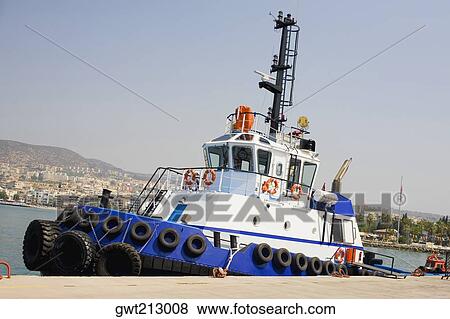 Tugboat at the dock, Ephesus, Turkey View Large Photo Image Stock Photo - Tugboat at the dock, Ephesus, Turkey. Fotosearch