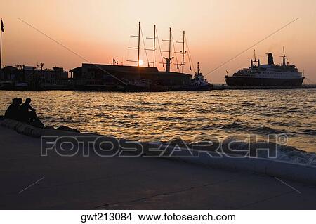 Two cruise ships moored at a harbor, Ephesus, Turkey View Large Photo Image Picture - Two cruise ships moored at a harbor, Ephesus, Turkey. Fotosearch