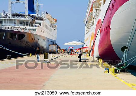 Two cruise ships moored at a harbor, Ephesus, Turkey View Large Photo Image Stock Photo - Two cruise ships moored at a harbor, Ephesus, Turkey. Fotosearch