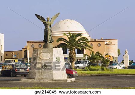Angel statue in front of a building, Rhodes, Dodecanese Islands, Greece View Large Photo Image Stock Photography - Angel statue in front of a building, Rhodes, Dodecanese Islands, Greece. Fotosearch