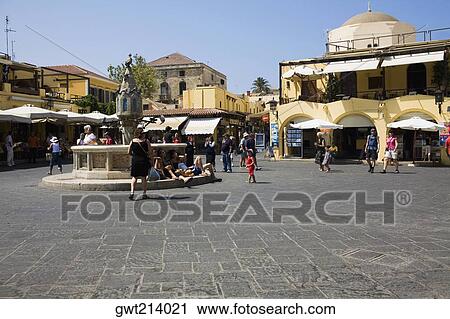 Stock Image - Fountain in the courtyard of a town, Sintrivani Fountain, Hippocrates Square, Rhodes, Dodecanese Islands, Greece. Fotosearch