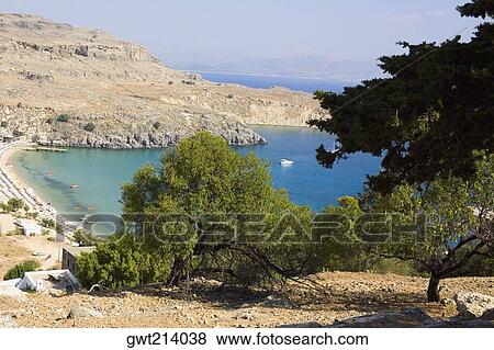 Stock Photo - High angle view of a beach, Lindos, Rhodes, Dodecanese Islands, Greece. Fotosearch
