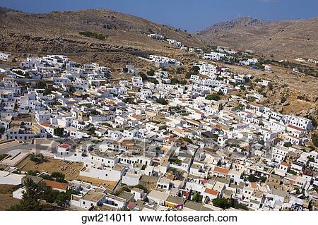 High angle view of a town, Lindos, Rhodes, Dodecanese Islands, Greece View Large Photo Image Stock Image - High angle view of a town, Lindos, Rhodes, Dodecanese Islands, Greece. Fotosearch