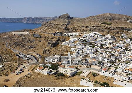 High angle view of a town, Lindos, Rhodes, Dodecanese Islands, Greece View Large Photo Image Stock Image - High angle view of a town, Lindos, Rhodes, Dodecanese Islands, Greece. Fotosearch
