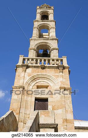 Low angle view of a bell tower, Panaghia Church, Lindos, Rhodes, Dodecanese Islands, Greece View Large Photo Image Stock Photography - Low angle view of a bell tower, Panaghia Church, Lindos, Rhodes, Dodecanese Islands, Greece. Fotosearch