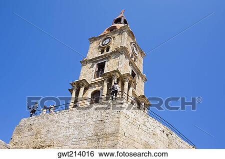 Low angle view of a clock tower, Mosque of Suleyman, Rhodes, Dodecanese Islands, Greece View Large Photo Image Stock Photograph - Low angle view of a clock tower, Mosque of Suleyman, Rhodes, Dodecanese Islands, Greece. Fotosearch
