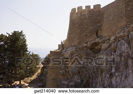 Low angle view of a fortress, Rhodes, Dodecanese Islands, Greece View Large Photo Image Stock Image - Low angle view of a fortress, Rhodes, Dodecanese Islands, Greece. Fotosearch