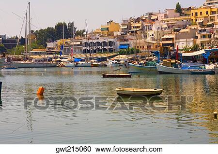 Boats in water with buildings in the background, Athens, Greece View Large Photo Image Stock Image - Boats in water with buildings in the background, Athens, Greece. Fotosearch