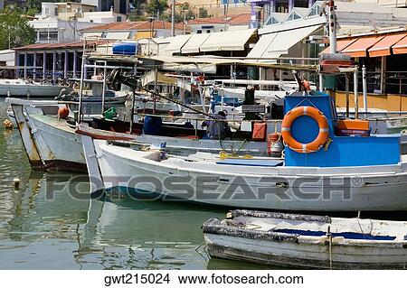 Picture - Boats moored at a harbor, Athens, Greece. Fotosearch
