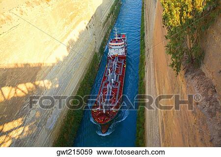 High angle view of a container ship in a canal, Corinth Canal, Athens, Greece View Large Photo Image Stock Photo - High angle view of a container ship in a canal, Corinth Canal, Athens, Greece. Fotosearch