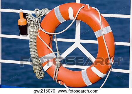 Life belt tied on the railing of a boat, Athens, Greece View Large Photo Image Stock Image - Life belt tied on the railing of a boat, Athens, Greece. Fotosearch