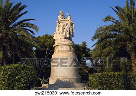 Stock Image - Low angle view of a statue in a garden, National Garden, Athens, Greece. Fotosearch