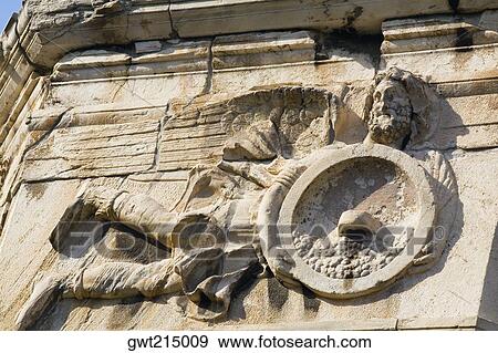 Low angle view of carving on a tower, Tower Of The Winds, Roman Agora, Athens, Greece View Large Photo Image Stock Photo - Low angle view of carving on a tower, Tower Of The Winds, Roman Agora, Athens, Greece. Fotosearch