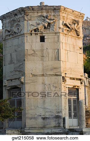 Low angle view of the old ruins of a tower, Tower Of The Winds, Roman Agora, Athens, Greece View Large Photo Image Stock Photo - Low angle view of the old ruins of a tower, Tower Of The Winds, Roman Agora, Athens, Greece. Fotosearch