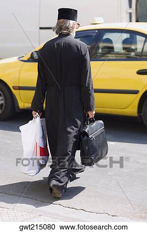 man carrying luggage